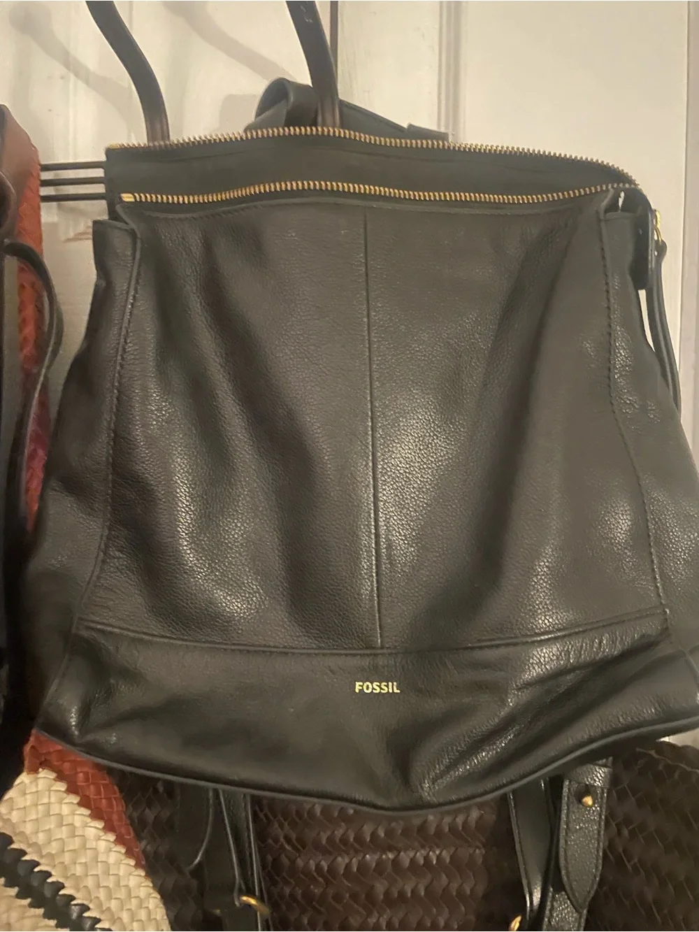 Fossil Black Leather Backpack with Gold Zipper Accents